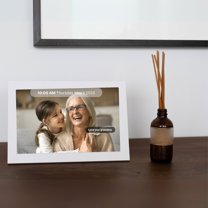 10.1 inch Memoryboard on a table with a photo of a grandma and her grandaughter tagged to provide more context